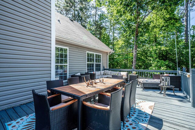 deck featuring an outdoor living space