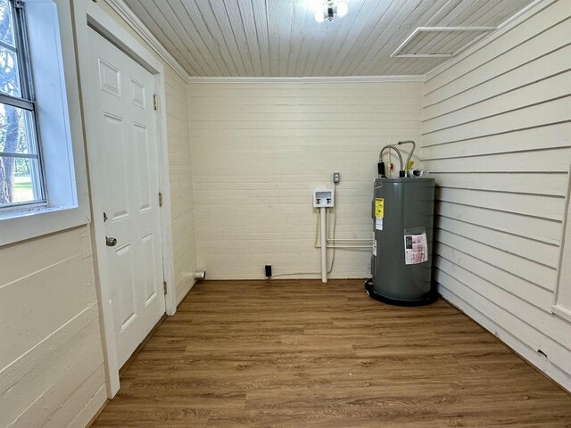 utility room featuring water heater