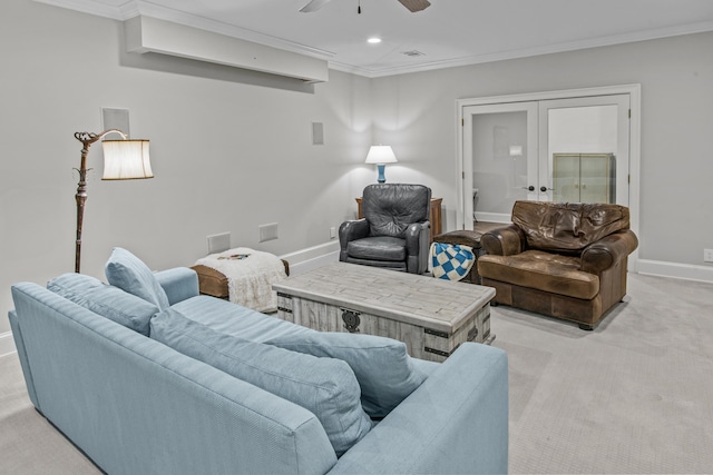 living room with baseboards, a ceiling fan, light colored carpet, ornamental molding, and french doors