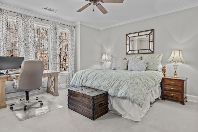 carpeted bedroom featuring ornamental molding, visible vents, ceiling fan, and baseboards