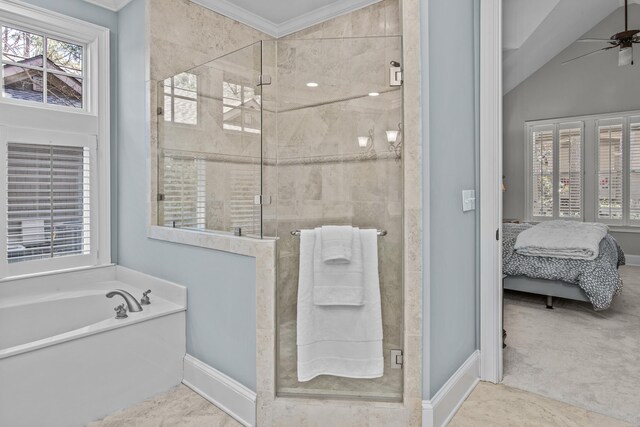 ensuite bathroom featuring a stall shower, ensuite bath, and a ceiling fan