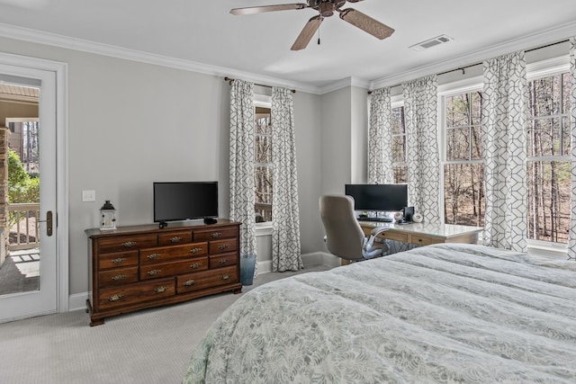 carpeted bedroom with crown molding, multiple windows, visible vents, and access to exterior