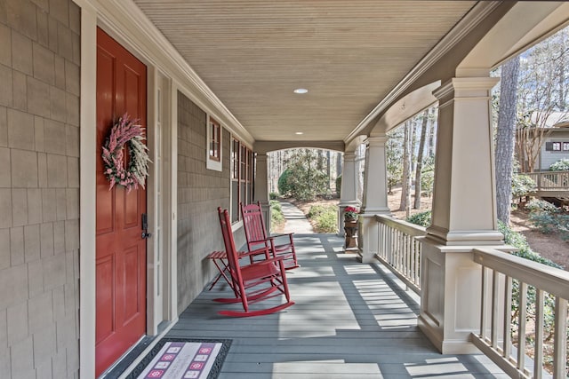 wooden terrace with covered porch