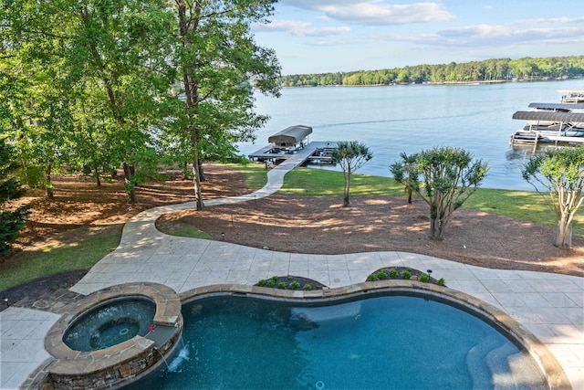 view of swimming pool featuring an in ground hot tub, a water view, and a dock