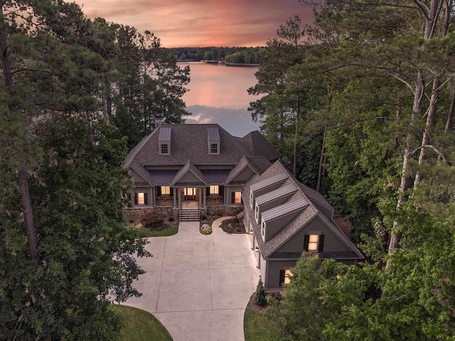 view of front of home featuring a water view