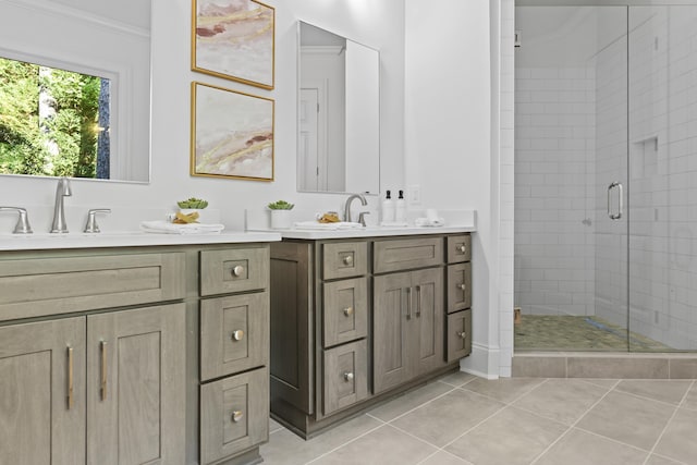 bathroom featuring ornamental molding, vanity, an enclosed shower, and tile patterned floors