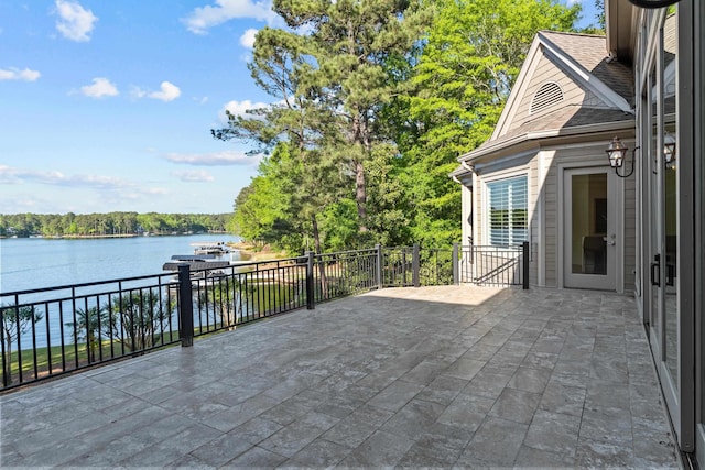 view of patio / terrace featuring a water view