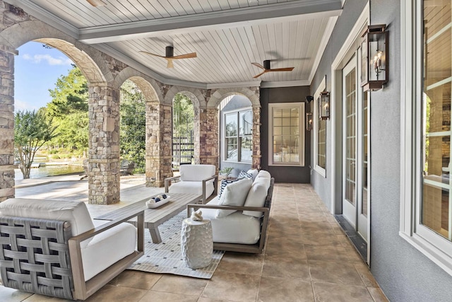 view of patio with ceiling fan and outdoor lounge area