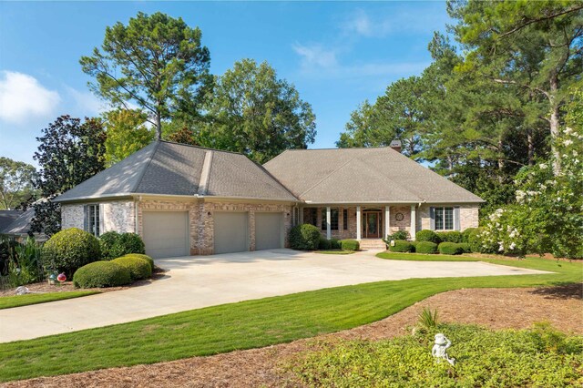 view of front of house featuring a garage and covered porch