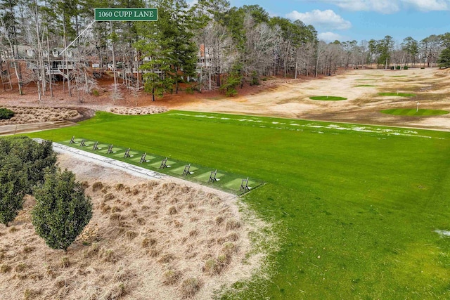 view of yard featuring view of golf course