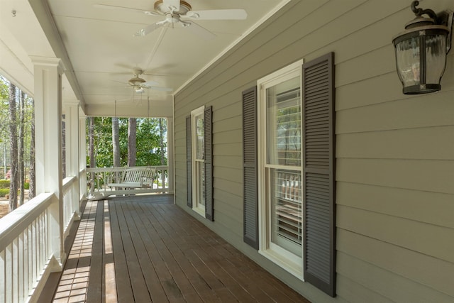 261 Reynolds Dr, Eatonton, GA 31024 - wooden porch featuring a ceiling fan
