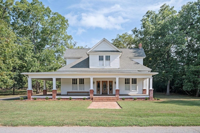 country-style home featuring a front yard and a porch