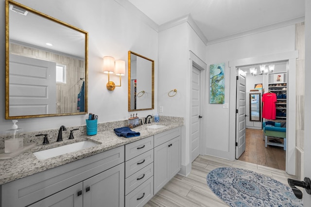 1181 Hidden Hills Cir, Greensboro, GA 30642 - full bathroom with double vanity, tiled shower, a closet, wood finished floors, and a chandelier