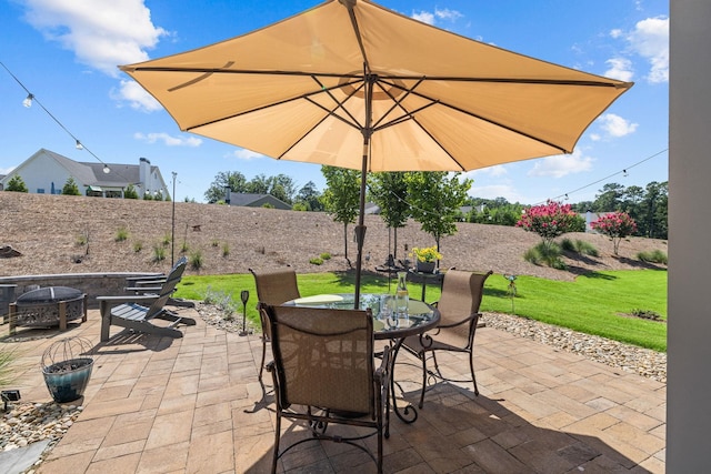 1181 Hidden Hills Cir, Greensboro, GA 30642 - fenced backyard with a patio and outdoor dining space