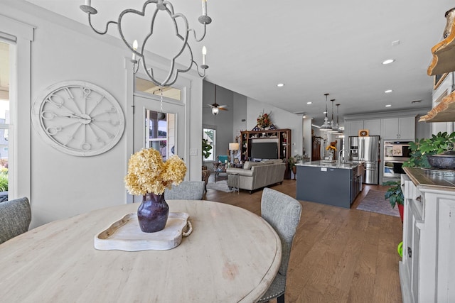 1181 Hidden Hills Cir, Greensboro, GA 30642 - dining room with dark wood finished floors, healthy amount of natural light, recessed lighting, and a ceiling fan