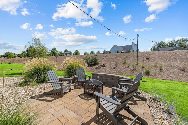 1181 Hidden Hills Cir, Greensboro, GA 30642 - view of patio featuring a fire pit