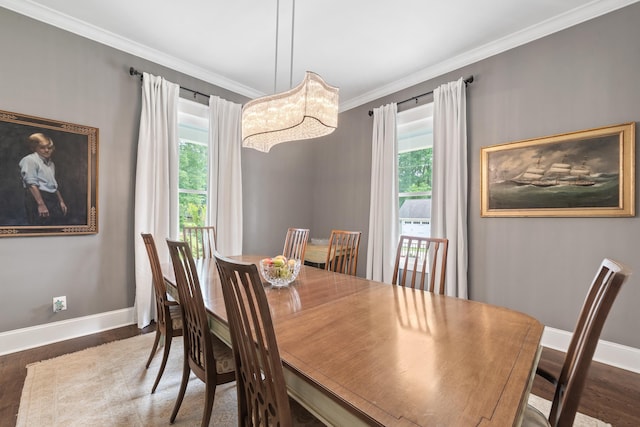 855 Jasper St, Madison, GA 30650 - dining area featuring wood finished floors and crown molding