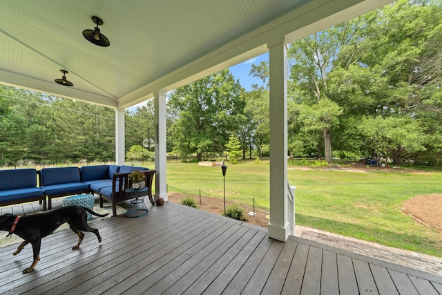 855 Jasper St, Madison, GA 30650 - deck with a lawn, view of wooded area, and an outdoor hangout area