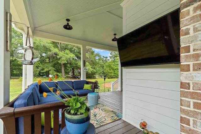 855 Jasper St, Madison, GA 30650 - porch with an outdoor living space and view of scattered trees