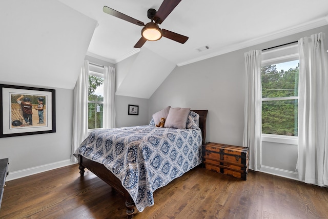 855 Jasper St, Madison, GA 30650 - bedroom featuring multiple windows, wood finished floors, vaulted ceiling, a ceiling fan, and crown molding