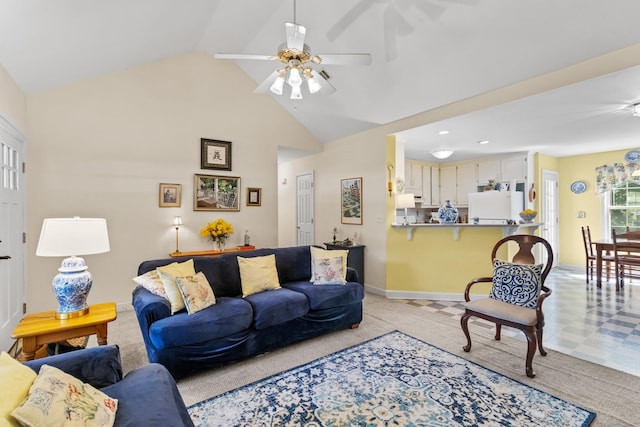 1027 Harper St, Madison, GA 30650 - living room featuring a ceiling fan and high vaulted ceiling