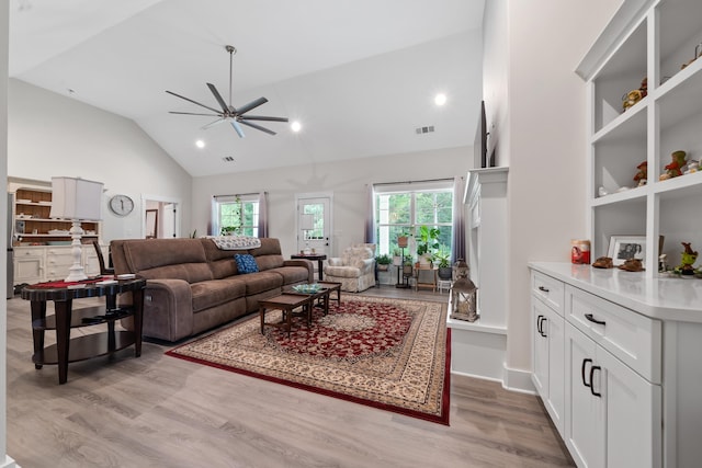 165 Hunters Chase Ct, Eatonton, GA 31024 - living room with ceiling fan, plenty of natural light, light wood finished floors, recessed lighting, and high vaulted ceiling