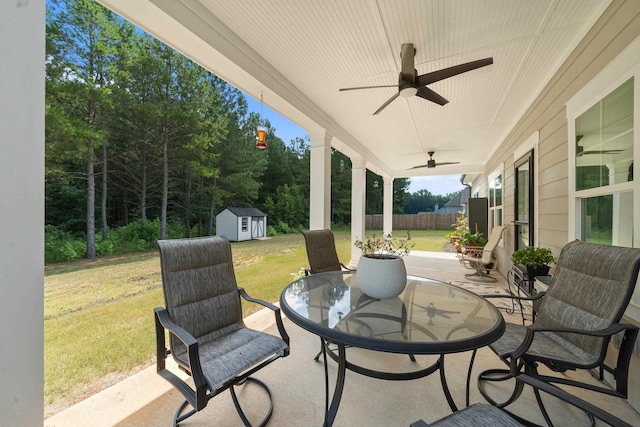 165 Hunters Chase Ct, Eatonton, GA 31024 - view of patio featuring a ceiling fan, a storage shed, and outdoor dining area