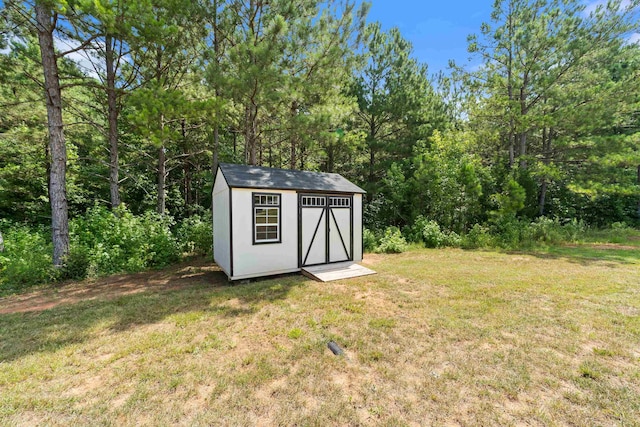 165 Hunters Chase Ct, Eatonton, GA 31024 - view of shed with a forest view