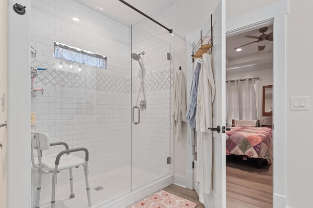 165 Hunters Chase Ct, Eatonton, GA 31024 - ensuite bathroom featuring wood finished floors, a shower stall, recessed lighting, and ceiling fan