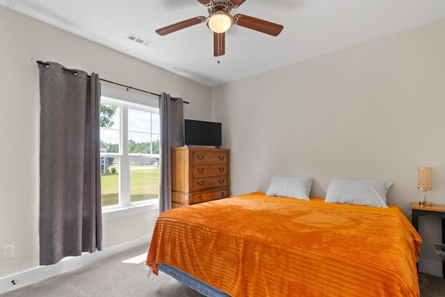 165 Hunters Chase Ct, Eatonton, GA 31024 - carpeted bedroom featuring ceiling fan and baseboards