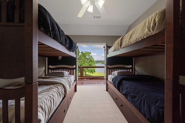 32 Lily Pt, Sparta, GA 31087 - bedroom with carpet, a water view, and a ceiling fan