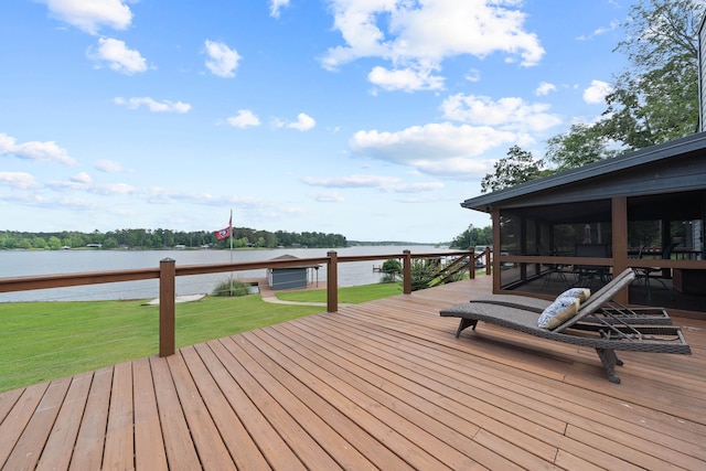 32 Lily Pt, Sparta, GA 31087 - deck with a sunroom, a water view, and a yard