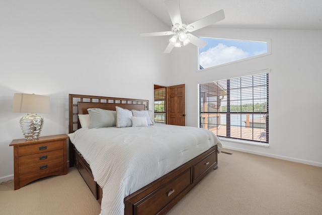32 Lily Pt, Sparta, GA 31087 - bedroom with light carpet, baseboards, a high ceiling, and ceiling fan