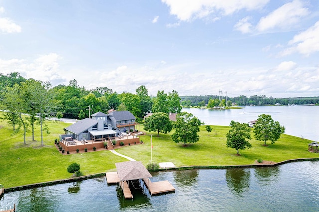 32 Lily Pt, Sparta, GA 31087 - dock featuring a yard, boat lift, and a deck with water view