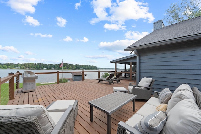 32 Lily Pt, Sparta, GA 31087 - wooden deck with an outdoor living space, a water view, and area for grilling