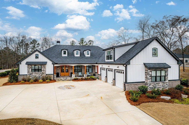 view of front of house featuring a garage and covered porch