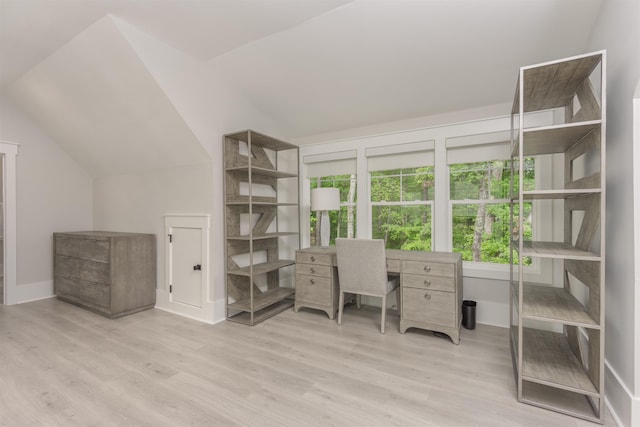 office area featuring lofted ceiling and light wood-type flooring