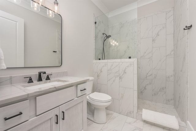 bathroom with vanity, toilet, and a tile shower