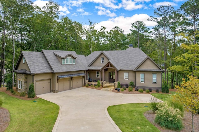 craftsman-style house with a garage and a front yard