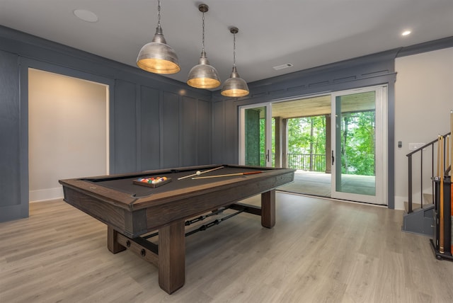 rec room with billiards and light hardwood / wood-style floors