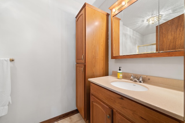 184 Crooked Creek Bay Rd, Eatonton, GA 31024 - bathroom with vanity and a textured ceiling