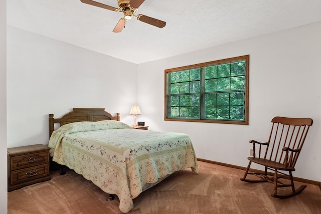 184 Crooked Creek Bay Rd, Eatonton, GA 31024 - bedroom with baseboards, carpet, and a ceiling fan