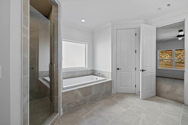 full bathroom with visible vents, a shower stall, plenty of natural light, and crown molding