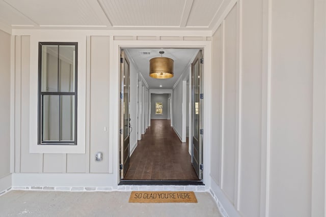 doorway to property with visible vents