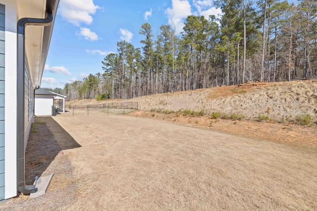 view of yard with fence