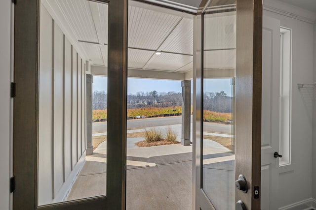 doorway featuring wood finished floors