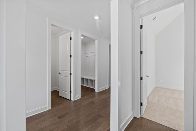 hall with recessed lighting, baseboards, and dark wood-style flooring