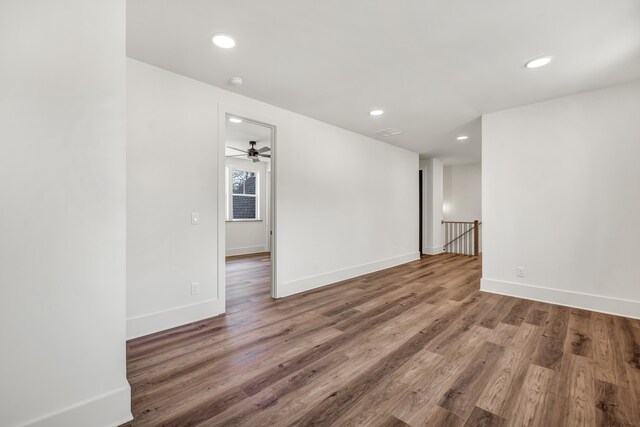 spare room featuring hardwood / wood-style floors