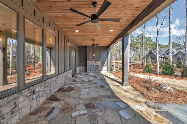 view of patio featuring ceiling fan