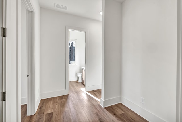 corridor featuring light hardwood / wood-style flooring